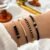Set de 4 Bracelets Noirs Femme – Élégance & Style – Perles et Finition Dorée