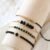 Set de 4 Bracelets Noirs Femme – Élégance & Style – Perles et Finition Dorée