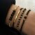 Set de 4 Bracelets Noirs Femme – Élégance & Style – Perles et Finition Dorée